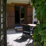 Gezellig terras met tuinmeubilair voor Chalet Carpe Diem.